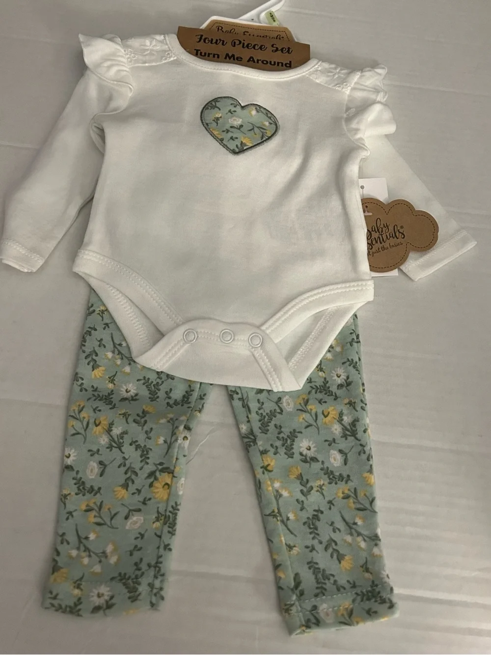 NWT Baby Essentials two soft, coordinated 4-piece sets. 3M perfect gift sets.